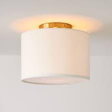These outdoor flush mount lights are typically made with attention to detail and include features like curved lines and intricate motifs like seeded glass inserts. Fabric Shade Flush Mount Lighting Drum