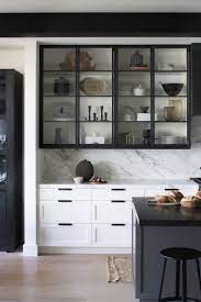 21 Kitchens With Black Cabinets That Make A Strong Case For The Edgy Trend Kitchen Cabinet Design Kitchen Remodel Kitchen Room Design