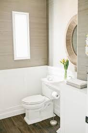 Uptown with elly brown teams up with walls need love to share with you how to apply wallpaper correctly and sharing our powder room decorating ideas or. Gray Grasscloth Powder Room Wallpaper With Wainscoting Transitional Bathroom