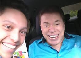 Maybe you would like to learn more about one of these? Apos Dias Recluso Silvio Santos Volta Ao Trabalho E Posa Com Fa Quem Quem News