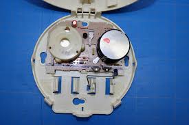 Usually with smoke alarms, if it is a green light, then it is usually trying to say that it is working properly unless otherwise specified on an instruction manual or on the if you carefully remove the detector, the manufacturer and model number are on the back of it. Smoke Alarm First Alert Sa88 Teardown
