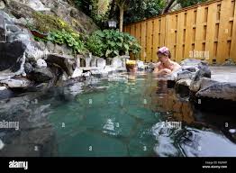 Mother and son in an idyllic outdoor bath Onsen, Japan Stock Photo - Alamy