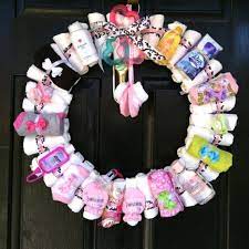 Another Type Of Diaper Wreath Baby Shower Wreath Diaper Wreath Diy Baby Stuff