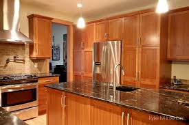 natural cherry cabis in kitchen island