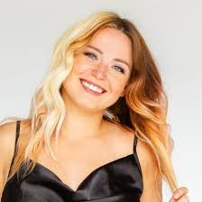 Who can recommend a hair and makeup artist in Estes Park for a wedding?