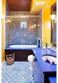 If you're looking to feature a bright, sunny and bold decor theme in your bathroom design, you may want to explore yellow bathroom decor ideas. Mediterranean Blue Bathroom By Susan E Brown Interior Design Gorgeous Sink Yellow Bathrooms Blue Bathroom Decor Yellow Bathroom Decor
