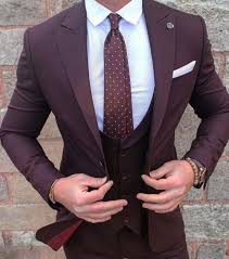 Which style is right for you? Burgundy Is The Hottest Color For 2018 Especially In A Trim Fitted Three Piece Suit With A Crisp White An Wedding Suits Men Wedding Suits Groomsmen Prom Suits
