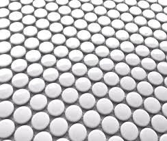 A white circle inside a red background. Penny Round White Porcelain 3 4 Mosaic Tile