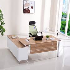 Does your office, reception area or conference room need a brand new look and style? New Design Luxury Modern Boss Office Furniture L Shape Modern Wooden Executive Office De Modern Office Table Design Office Furniture Modern Office Table Design