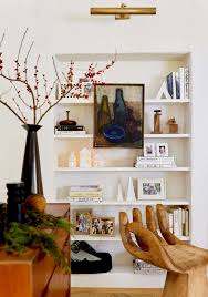 Stylist Hack 7 Unexpected Places I Like To Hang Art To Make Your House Look Unique Emily Hender Home Decor Decor Christmas Decorations Living Room