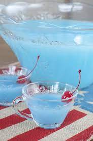Blue Pina Colada Party Punch Wishes And Dishes Recipe Party Punch Recipes Blue Punch Recipe Punch Drinks