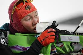 This video shows biathletes at previous winter olympics. Biathletes Battling Difficult Conditions At Winter Olympics