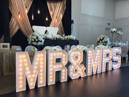 A Beautiful Gold And Black Backdrop With Marquee Letters Fresh Florals Just Make Th Head Table Wedding Decorations Head Table Wedding Sweetheart Table Wedding