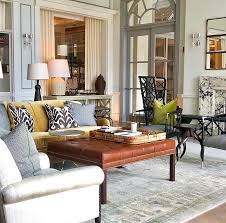 Two Chairs Facing Each Other With A Small Table In Between Behind Two Chairs And Table In Between Living Room Decor Modern Living Room Decor Home Decor