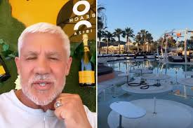 Wayne Lineker gets 'steaming drunk' and parties alone at his beach club  after Ibiza makes the green list