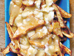 But according to some sources, it all started in a restaurant called le lutin qui rit, in quebec — with a customer and the restaurant owner. The Scrumptuous Mess That Is Poutine Quebec S National Food Haaretz Com Haaretz Com
