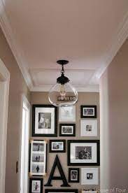 Mini flush mount fixtures with an unexpected design twist are a great way to liven up your hallway. Little House Of Four Creating A Beautiful Home One Thrifty Project At A Time Hallway Lighting Hallway Light Fixtures Living Room Lighting