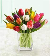 Mixed Tulips Make A Great Springtime Presentation As An Added Bonus We Have Included A Classic Glass Vase With Your B Tulip Centerpiece Tulip Bouquet Flowers
