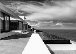 Stark White Walls Frame Vistas Of The Ionian Sea From A Bright White House By Brussels Based Archite Architecture Modern Architecture House Modern Architecture