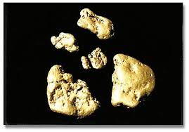 Then they had it cut into several different stones for pendants and ear rings. Focus On Gold