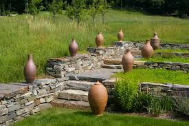 sculptural pots in the garden, with stephen procter
