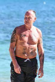 Former england star paul gascoigne was reportedly tackled by a security guard on his way out of waitrose after taking a bottle of wine from the shop without paying for it. Shirtless Paul Gascoigne Arrives On Celebrity Island After Dropping From Helicopter Mirror Online