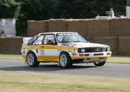 With the engine still mounted ahead of the front axle, the short wheelbase sport quattro had massive overhangs that made for very strange proportions. Audi Sport Quattro S1 E2 Group B Rally Group B Shrine