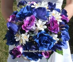 Let our lovely purple flowers color your wedding day. Wedding Flower Bouquets Wedding Bouquets Purple Blue Purple Wedding Bouquets Blue Wedding Flowers