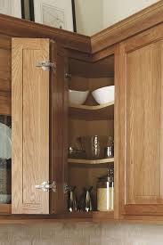 Curved base corner storage units can stow away bulky kitchen essentials such as spice racks, wine coolers and tin trays. The Wall Easy Reach Cabinet Allows You To Access Any Item In The Cabinet With Ease While Ma Corner Kitchen Cabinet Kitchen Design Decor Kitchen Corner Cupboard