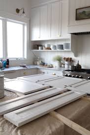 Painting laminate kitchen cabinets is possible, but more tricky than painting wood or mdf cabinets. Diy How To Paint Cabinets By Hand An Update On Our Farmhouse Pantry The Grit And Polish