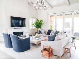 True blue—whether of the sky or navy variety—is one of the most versatile decorating hues for any room. 20 White Rooms In 2020 Blue Accent Chairs Blue Accents Living Room Dining Room Accents