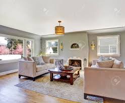 Find the best light wood coffee tables for your home in 2021 with the carefully curated selection available to shop at houzz. Light Grey Living Rom With Hardwood Floor And Rug Furnished With White Sofas And Wooden Coffee Table Stock Photo Picture And Royalty Free Image Image 30051358