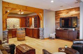 The exposed wood beams on this basement ceiling are a rustic but contemporary architectural feature. Rustic Basement Reveal Bright Ideas By Martinec