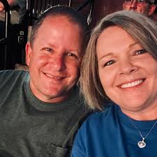 What do you wear as your school nurse uniform? Scrubs, dressier clothes?