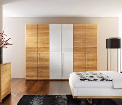 Luxury Modern Wardrobe Shown In Beech And Glass Bed Design Furniture Design Modern Minimalist Bedroom
