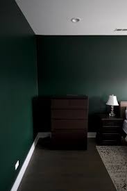 Our Favorite Dark Green Paint Color The Diy Playbook Green Bedroom Walls Dark Green Walls Green Walls Living Room