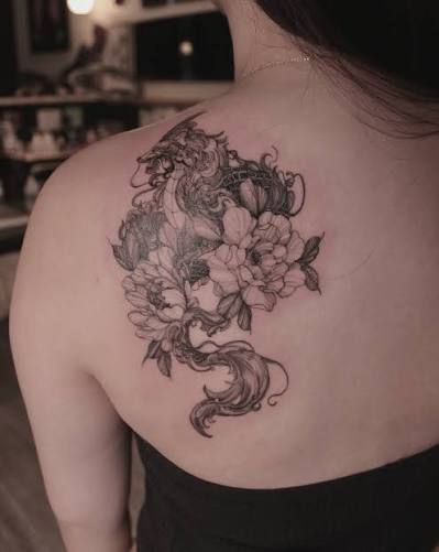 Fine line Dragon tattoo with flower set on shoulder blade . sternum // spine // chest // collar bone tattoo design fineline//outline//realism//cover up tattoo & design For booking: https://11pcgx7i4rp.typeform.com/wongtattooer Deposit Required. Design
