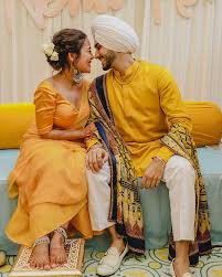 Rohanpreet And Neha Kakkar S Haldi Ceremony Pictures In 2020 Haldi Ceremony Couple Photoshoot Poses Wedding Couple Poses Photography