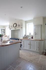 Beautiful Country Kitchen With A Modern Feel Created By Pale Units And A Stone Floor Yew Tre Country Kitchen Designs Interior Design Kitchen Kitchen Interior