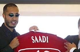 An interpol notice was issued against him in 2011. Ø­Ù‚ÙŠÙ‚Ø© ØµØ§Ø¯Ù…Ø© Ù„Ù‡Ø°Ø§ Ø§Ù„Ø³Ø¨Ø¨ Ø§Ù†Ø¶Ù… Ù†Ø¬Ù„ Ø§Ù„Ù‚Ø¯Ø§ÙÙŠ Ù„ÙØ±ÙŠÙ‚ Ø¥ÙŠØ·Ø§Ù„ÙŠ