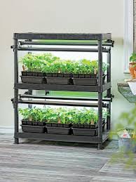 Maybe you would like to learn more about one of these? Gardener S Potting Bench With Shelves Grow Lights Backyard Aquaponics Aquaponics Diy