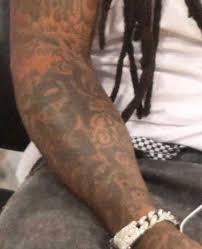 Lil wayne got some new tattoos on his face this week — one on his chin and another along his eyebrow, as depicted above — and tattoo artist spider shared the ink work in a pair of instagram posts. Lil Wayne S Favorite Tattoo Who Is Rabbit His Stepfather