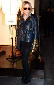 Mary Kate Orange Wayfarer Sunglasses Balenciaga Harness Boots Wedge Givenchy Big Gold Studded Moto Leather Jacket Tights Olsen Fashion Style Olsen Twins Style