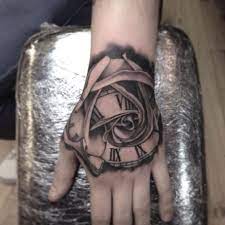 101 Best Rose Tattoo Ideas For Women Tattoo Ideas In 2021 Rose And Clock Tattoo Clock Tattoo Rose Clock Tattoo
