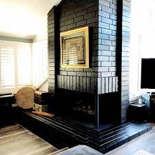 Using your broom and vacuum, brush off/vacuum the entire surface of the bricks. Painted Black Brick Fireplace Diy Inspired