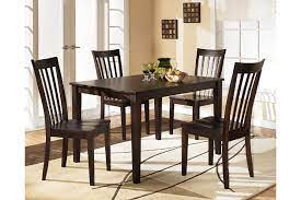 Rokane dining table and 8 chairs set. Hyland Dining Set Ashley Furniture Homestore