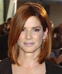 Not only that, but it's also the most common hair length. Sandra Bullock Medium Straight Auburn Brunette Bob Haircut