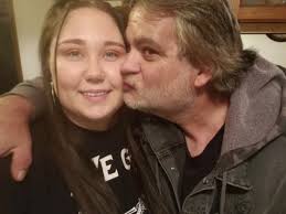 US woman in a relationship with ex-boyfriend's dad