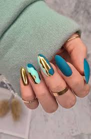 Beautiful geode nails are starting to pop up everywhere in 2017. 47 Beautiful Nail Art Designs Ideas Teal And Gold Fall Nail Idea