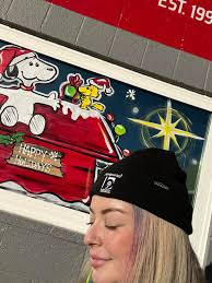 It was so bright I couldn't even open my eyes 😂 vandalized some windows  today though, first time doing a Snoopy theme 🙂 #facepainter  #windowpainter #artist #snoopy #snoopychristmas #christmastime
